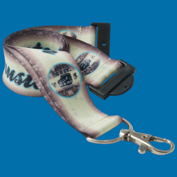 A rolled up lanyard with writing and logos